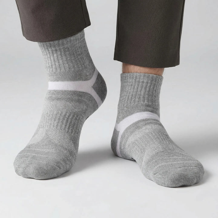 Snug-fit men's athletic ankle socks, providing active comfort and support for any sport or activity.
