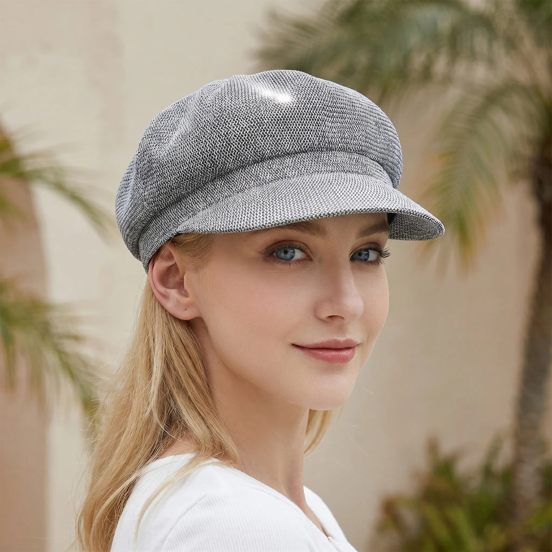 Women's breathable open-weave sun hat, perfect for summer. Lightweight and stylish beach accessory.