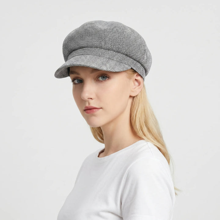 Close-up of women's open-weave sun hat texture, showing breathable design for summer comfort.