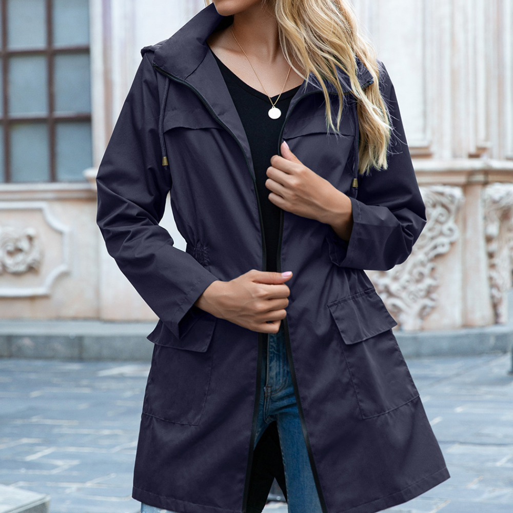 Elegant women's zip-up trench coat, a long versatile jacket suitable for all seasons and sophisticated looks.