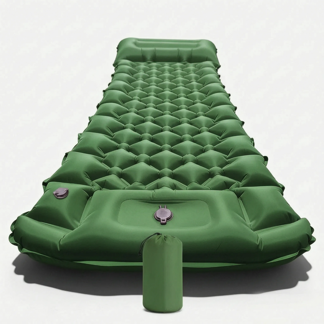 Unrolled inflatable camping sleeping mat with an integrated pillow, ready for a comfortable night's sleep outdoors.