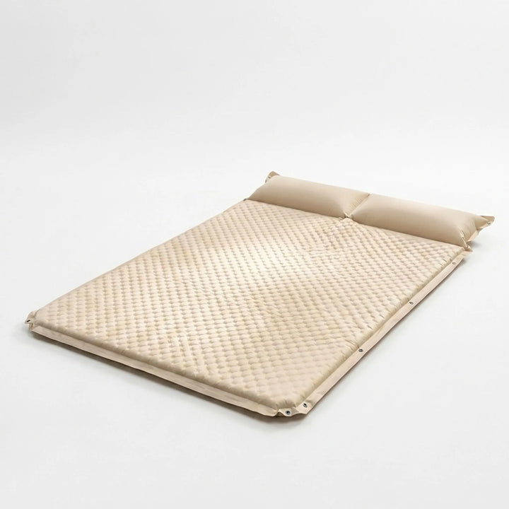 Lightweight self-inflating sleeping pad with pillow, perfect for camping, hiking, and travel comfort.