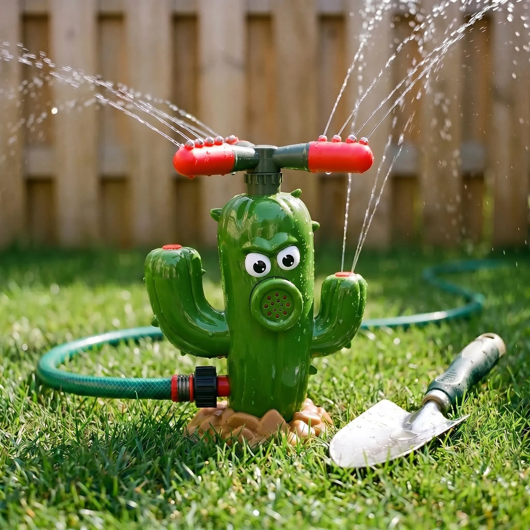 Bright green cartoon cactus water sprinkler toy spraying for kids' outdoor play.
