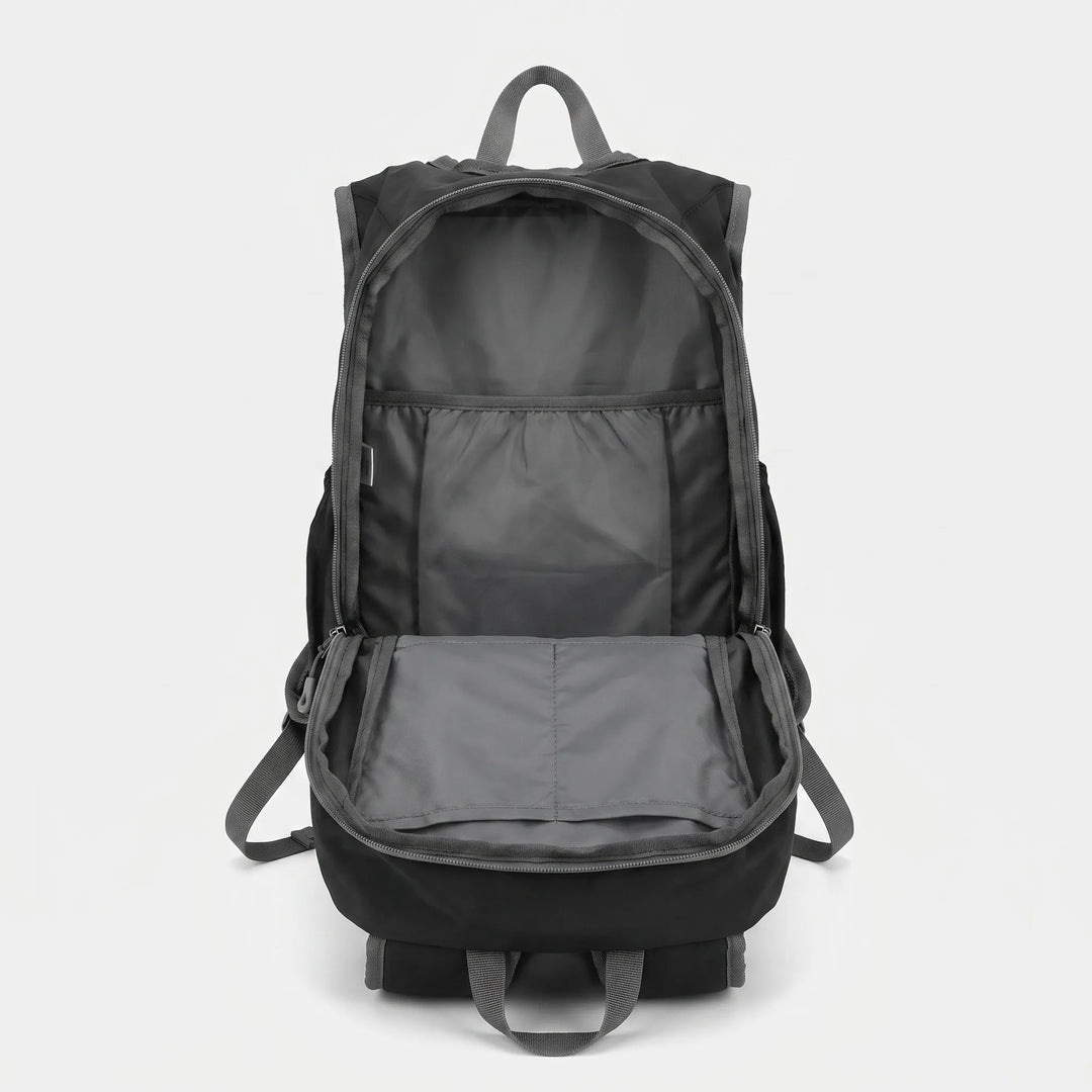 Casual unisex daypack, ideal for travel and daily errands, highlighting its durability.