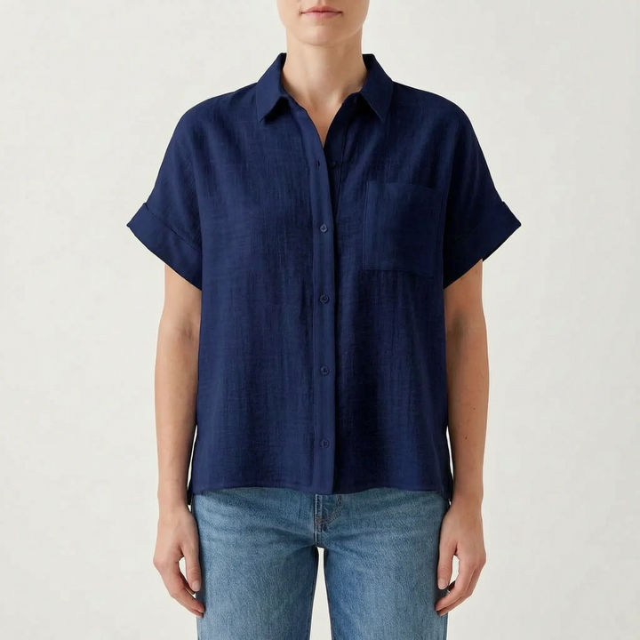 Solid color women's short sleeve button-down shirt, a relaxed fit casual top with chest pocket.