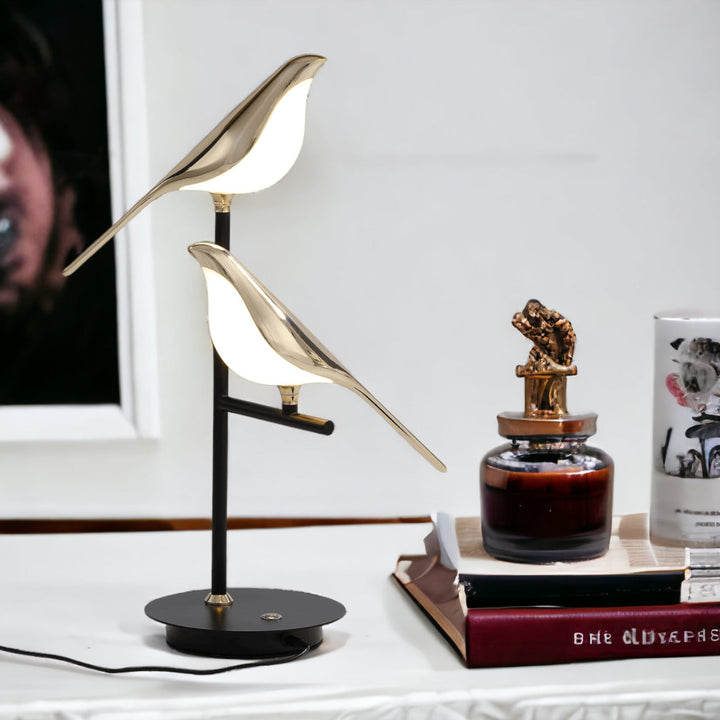 Gold bird LED wall lamp, a stylish avian light fixture. Enhance your modern bedroom or living room decor.