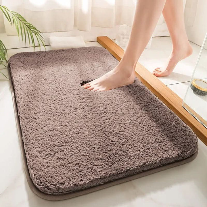Modern luxury bath mat, ultra soft microfiber, highly absorbent & non-slip for safe bathroom use.