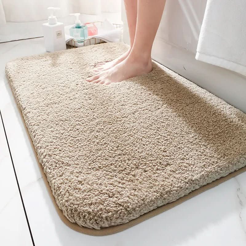 Thick velvet bath mat for bathroom, plush and absorbent, offering luxury and comfort underfoot.