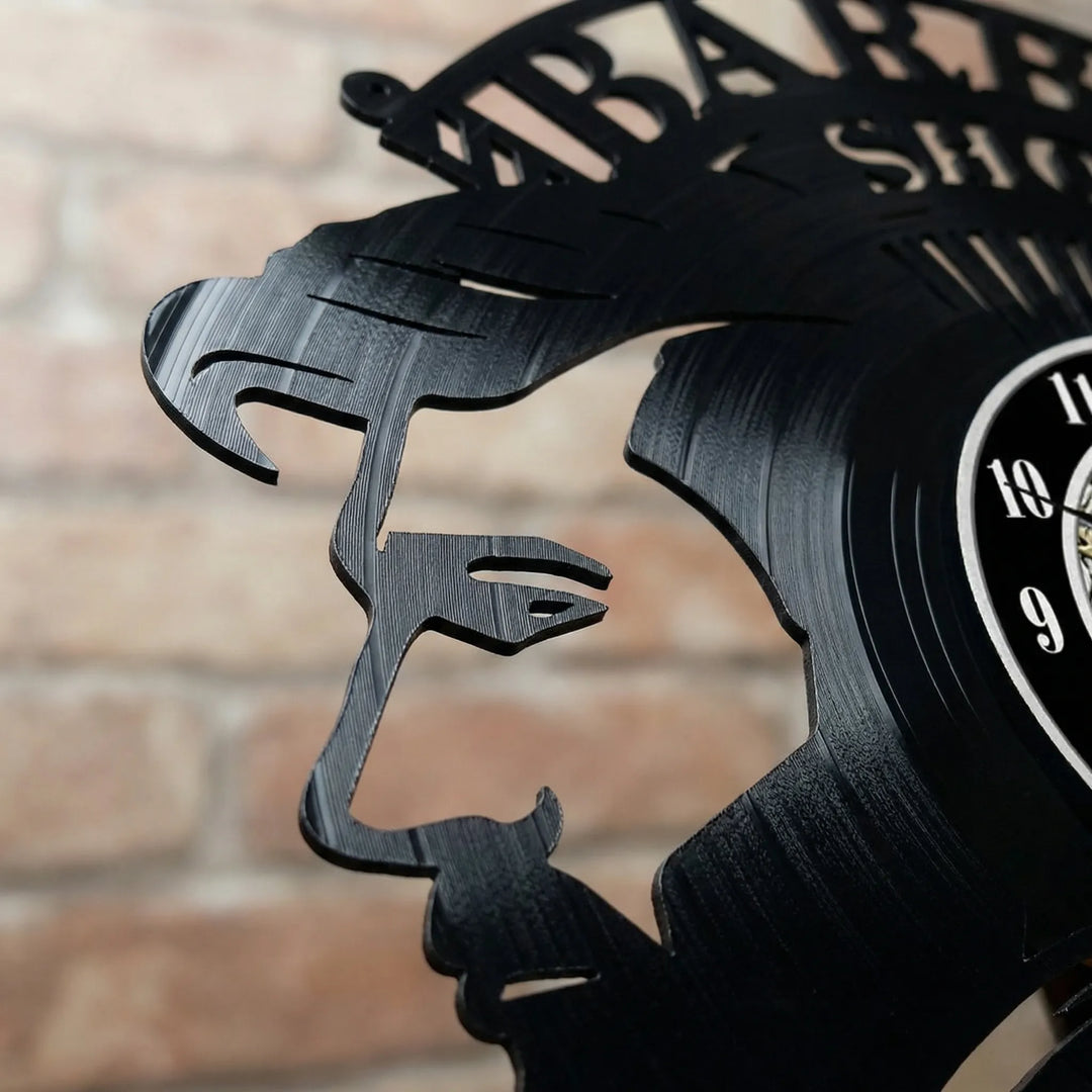 Decorative retro barber shop wall clock, black & white design for vintage shop decor & professional salon ambiance.