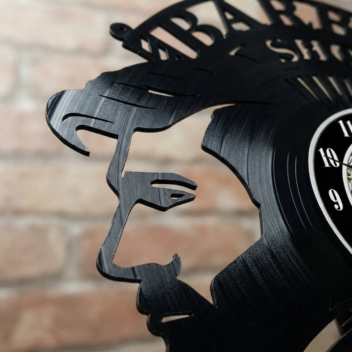 Decorative retro barber shop wall clock, black & white design for vintage shop decor & professional salon ambiance.
