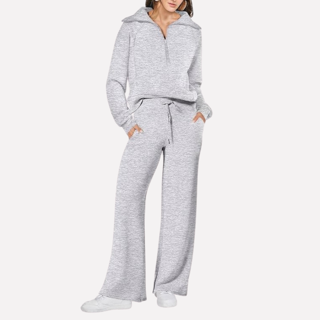 New women's lounge wear: comfy 2-piece set with a stylish top and wide-leg elastic waist pants for relaxation.