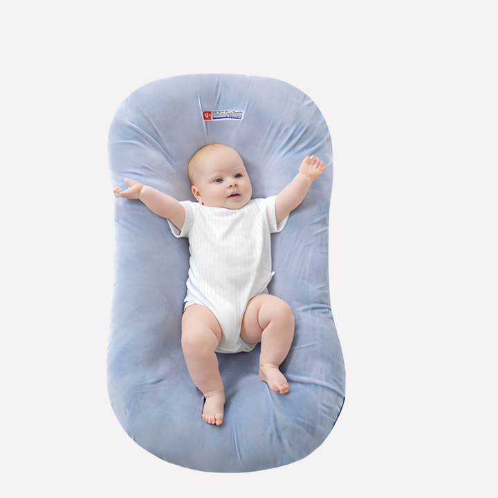 Portable infant pillow for head & neck support. Ideal for baby sleep in cribs, strollers, or while traveling. Baby care.
