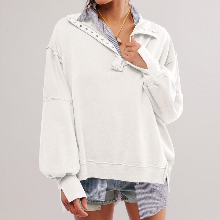 Soft women's oversized pullover, ideal for cozy fall fashion or comfortable spring style. Versatile everyday sweater.