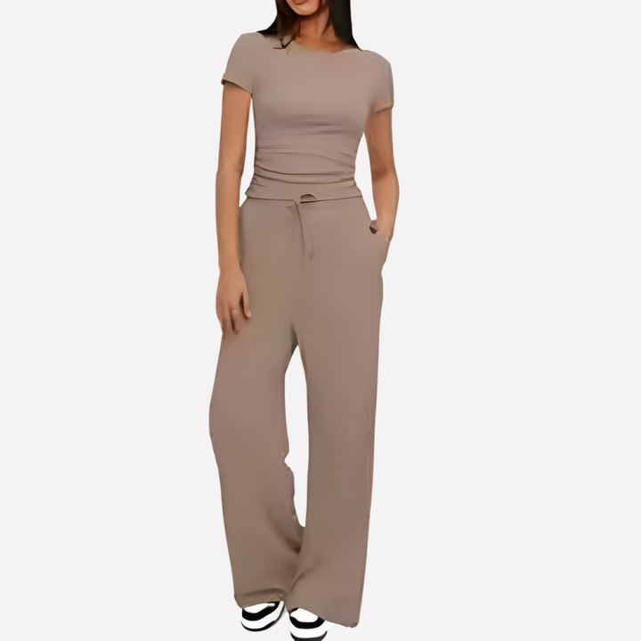 Soft rayon blend women's 2-piece lounge set with wide leg pants & crop top, offering ultimate comfort for home or travel.
