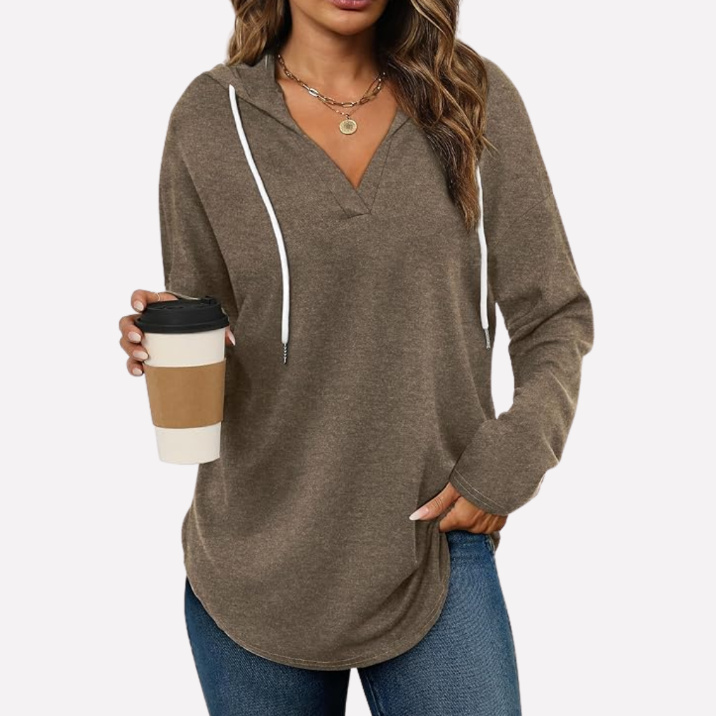 Women's soft oversized hooded pullover sweatshirt, delivering ultimate comfort and relaxed fit.