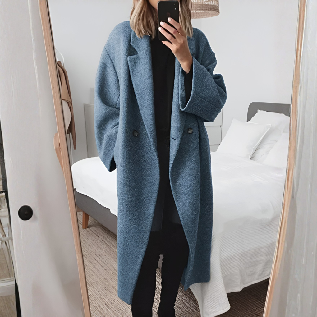 Elegant women's structured long winter coat, stylish cold weather outerwear. Perfect for formal or everyday wear.