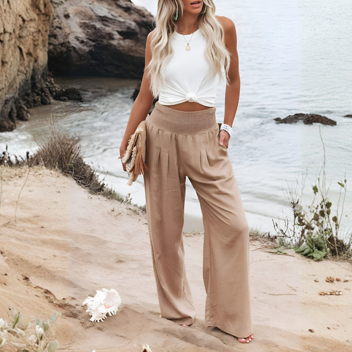 Relaxed fit wide-leg palazzo pants for women, high-waisted and comfortable for summer days.