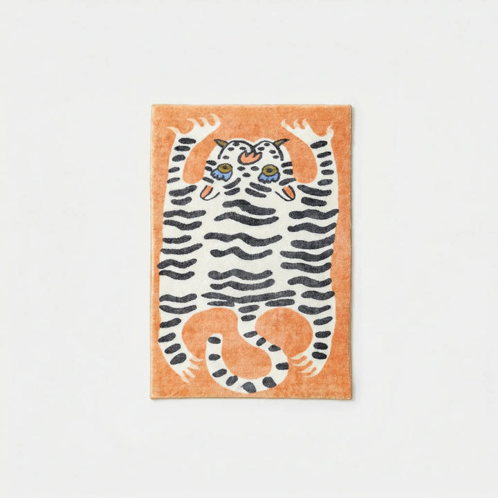 Colorful low pile area rug, animal print with wavy design, a fun addition to any kids' bedroom.
