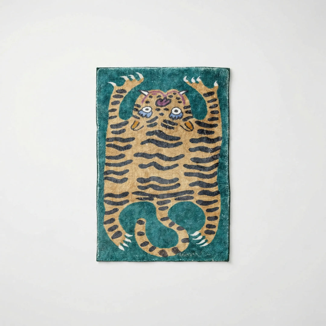 Flowique area rug: a playful animal print rug with waves, designed for colorful kids' rooms.