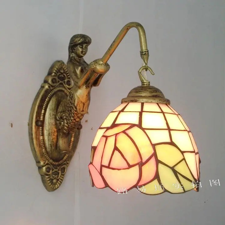 Elegant mermaid glass LED wall light, a decorative lamp bringing artistic lighting to your home.