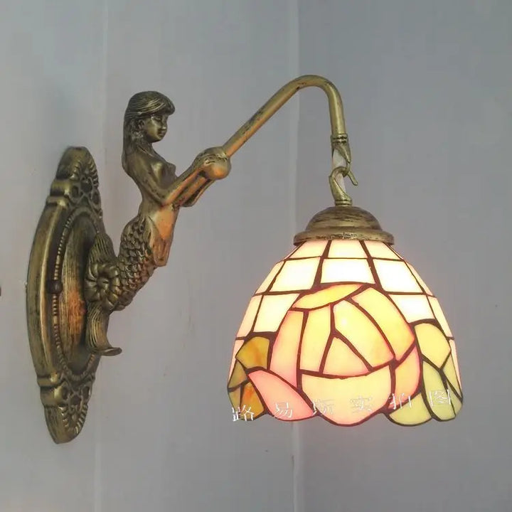 Stained glass mermaid LED wall light, a unique artistic touch for indoor spaces.