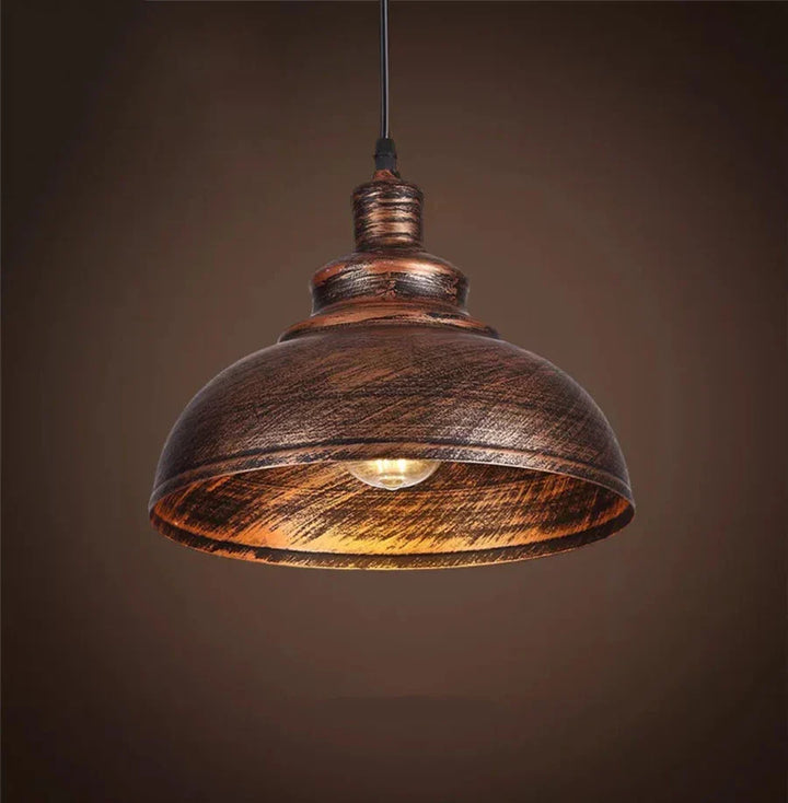 Rustic iron ceiling light, farmhouse pendant, adds vintage charm to dining areas.