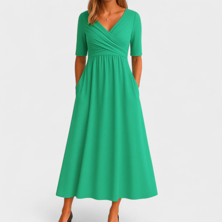 Versatile women's V-neck midi dress with crossover waist. Great for casual, work, or elegant occasions.