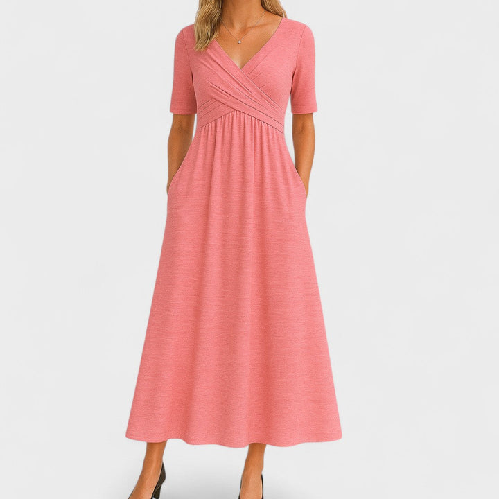 Flattering red V-neck midi dress for women, designed with a chic crossover waist for an elegant look.