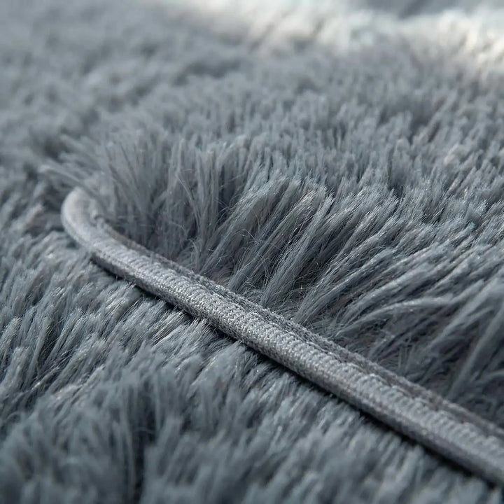Flowique wave pattern rectangular area rug; soft plush, low pile & non-slip for versatile home decor.
