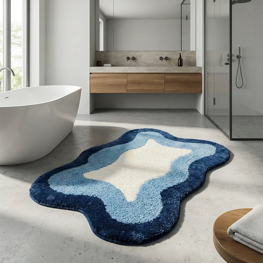 Luxury non-slip Flowique bath rug with a modern wave design, enhancing bathroom safety and comfort.