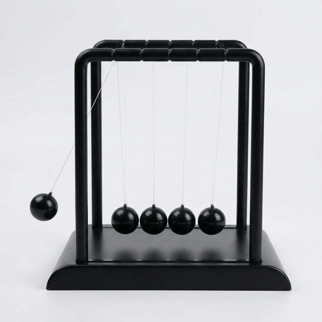 Calming kinetic desk ornament with magnetic motion, perfect tabletop sculpture for relaxation.
