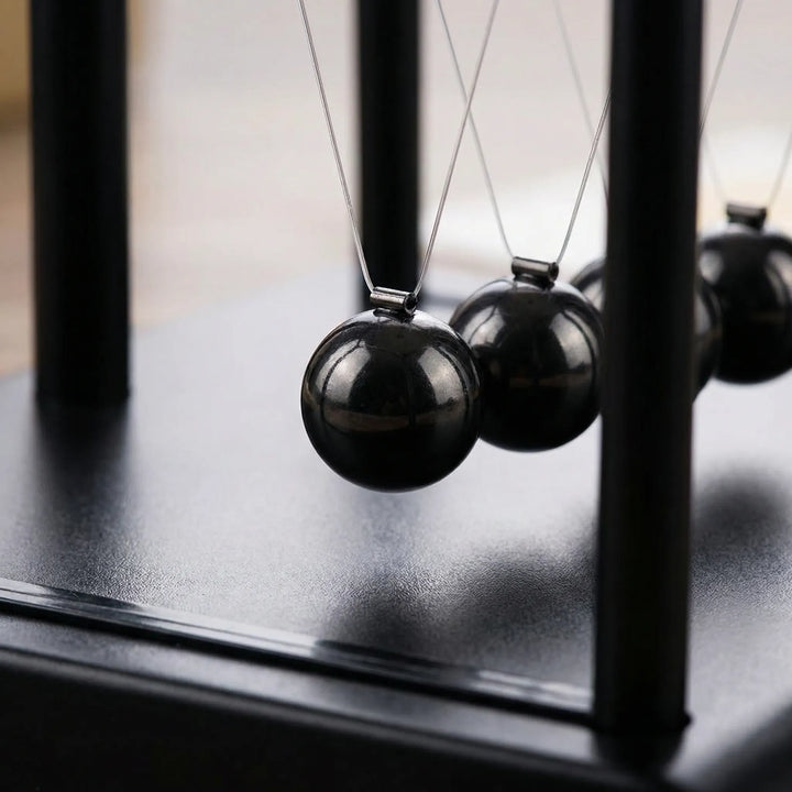 Kinetic magnetic art, modern desk ornament for office, home accent, and stress relief.