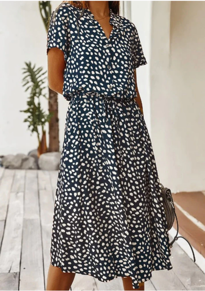Comfortable & chic spotted polka dot midi dress for women, featuring a full button-down front.