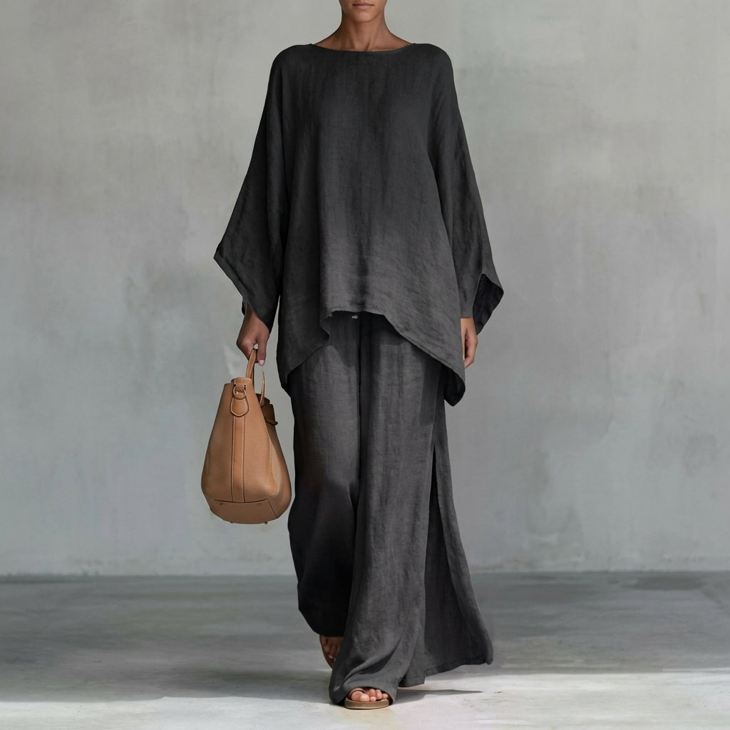 Stylish women's 2-piece outfit: comfortable tunic top & a graceful maxi skirt. Perfect for elegant, relaxed wear.