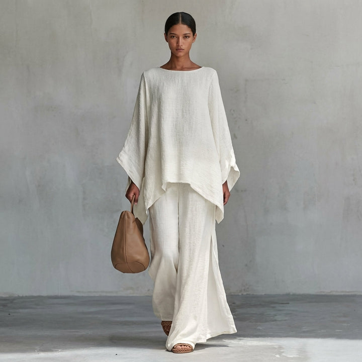 Women's flowing two-piece set: elegant tunic top & maxi skirt. Relaxed fit, perfect for resort or casual chic.