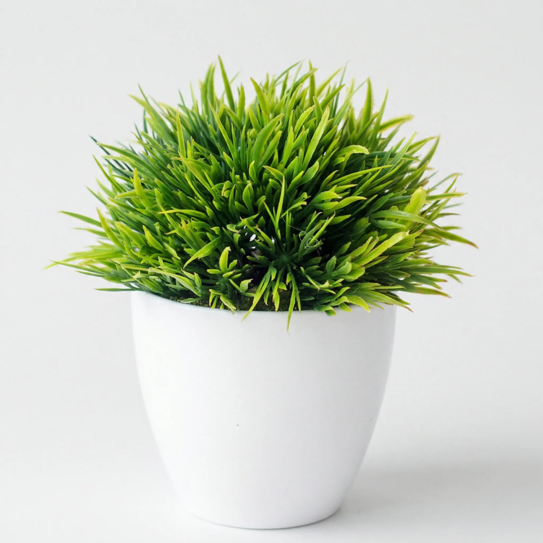 Compact sculpted tabletop tree, faux plant adds peaceful, elegant touch to small spaces.