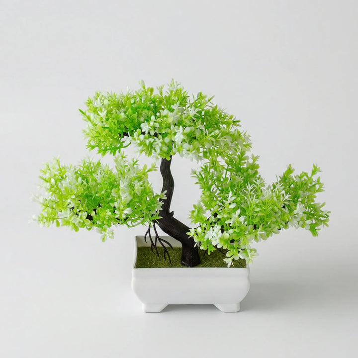 Elegant faux plant: mini sculpted tabletop tree, perfect for modern home decor shelves.
