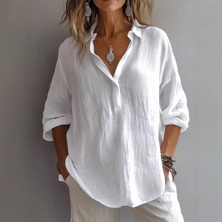 Women's stylish button-down shirt with wide sleeves, relaxed fit, perfect for casual or office wear.