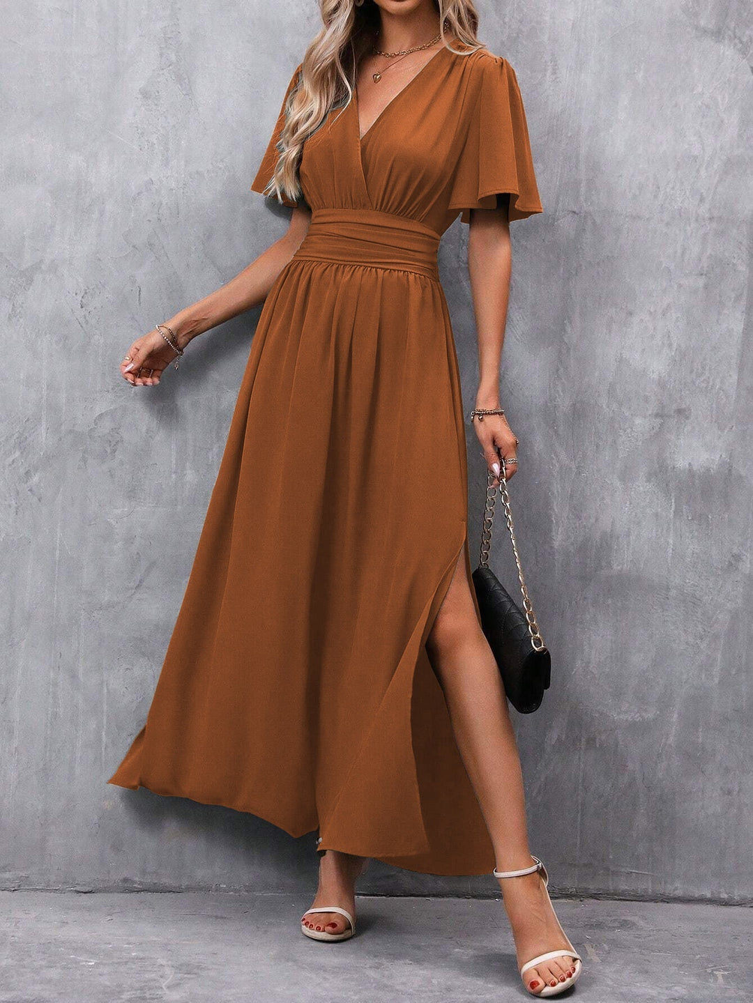 Stylish A-line maxi dress with empire waist & flutter sleeves. Comfortable and elegant for parties or summer wear.