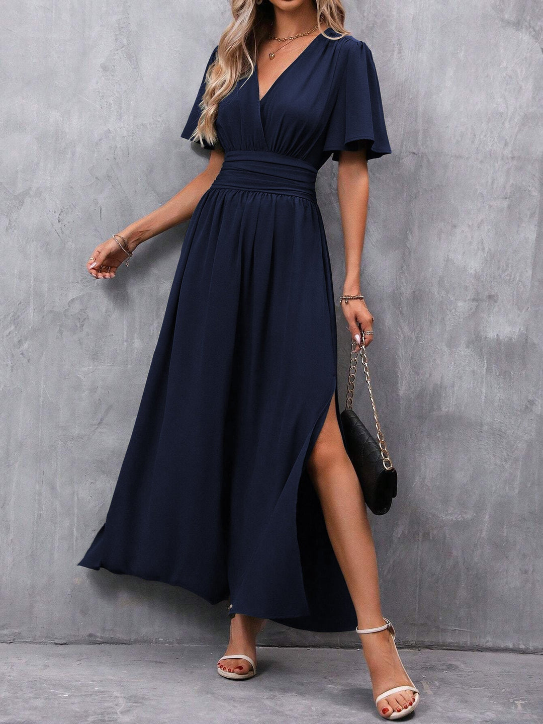 Effortless ankle-length maxi dress for women, featuring a flattering V-neck & flutter sleeves. Ideal for summer fashion.