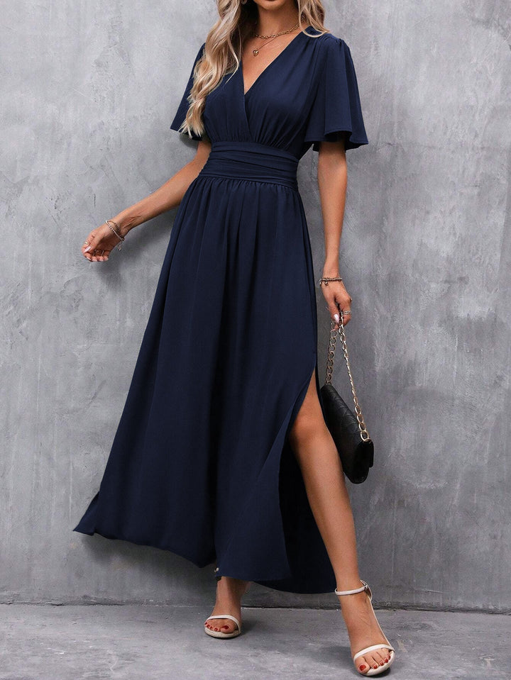 Effortless ankle-length maxi dress for women, featuring a flattering V-neck & flutter sleeves. Ideal for summer fashion.