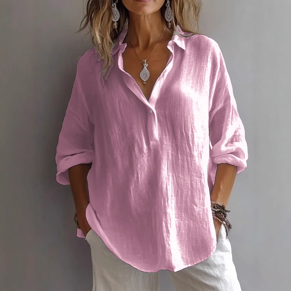 Relaxed fit women's shirt, stylish button-down, wide sleeves for a chic casual top.