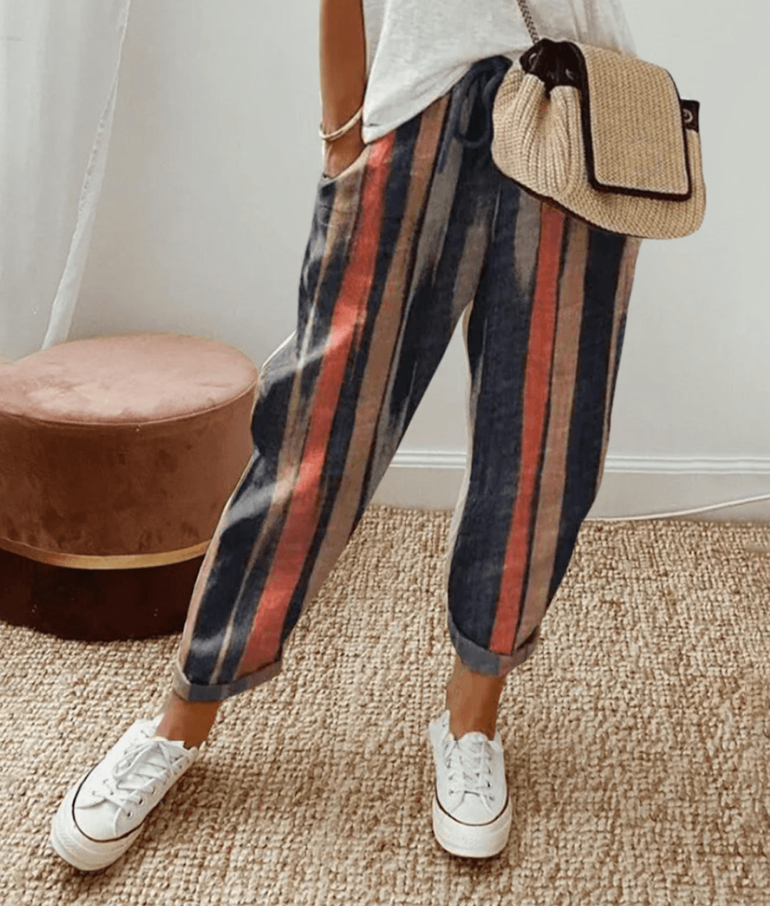 Women's flattering print trousers with a comfortable drawstring waist, perfect for casual chic or loungewear.