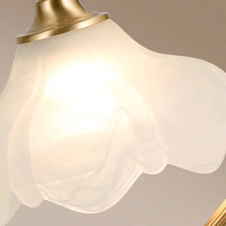 Beautiful floral glass lamp with gold accents, dimmable feature for versatile home lighting.