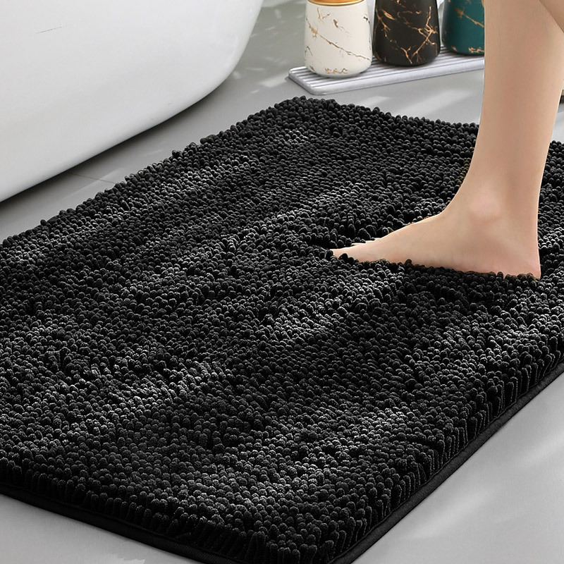 Highly absorbent bath mat quickly dries feet. Features a non-slip backing for stability, easy to machine wash.