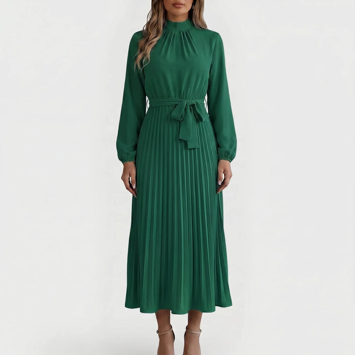 Women's flattering long-sleeve midi dress, elegantly pleated with a waist-cinching tie, suitable for spring/fall.