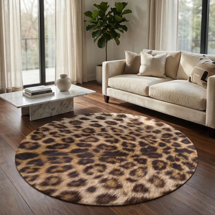 Round leopard print area rug. Soft, patterned accent rug for stylish living room or bedroom home decor.