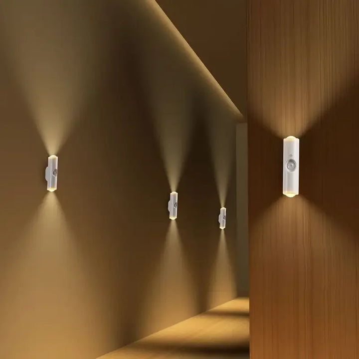 Modern LED wall light with motion sensor; a cordless & rechargeable accent light.