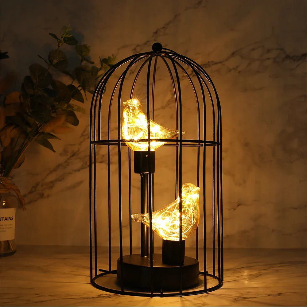 Battery operated birdcage LED lamp, cordless fairy light decor for romantic ambiance.