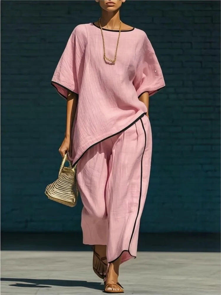 Effortless women's cropped pant & top set, a stylish two-piece outfit for comfortable, elegant casual wear.